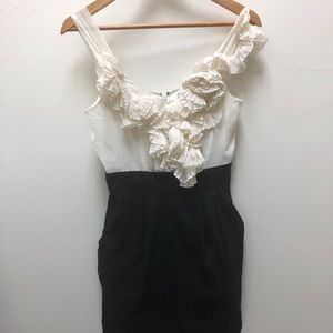 Black and white ruffled dress.